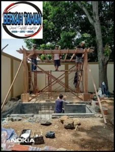 Pembuatan Kolam koi dan Pergola kayu di Yasmin Bogor oleh Berkah taman Group